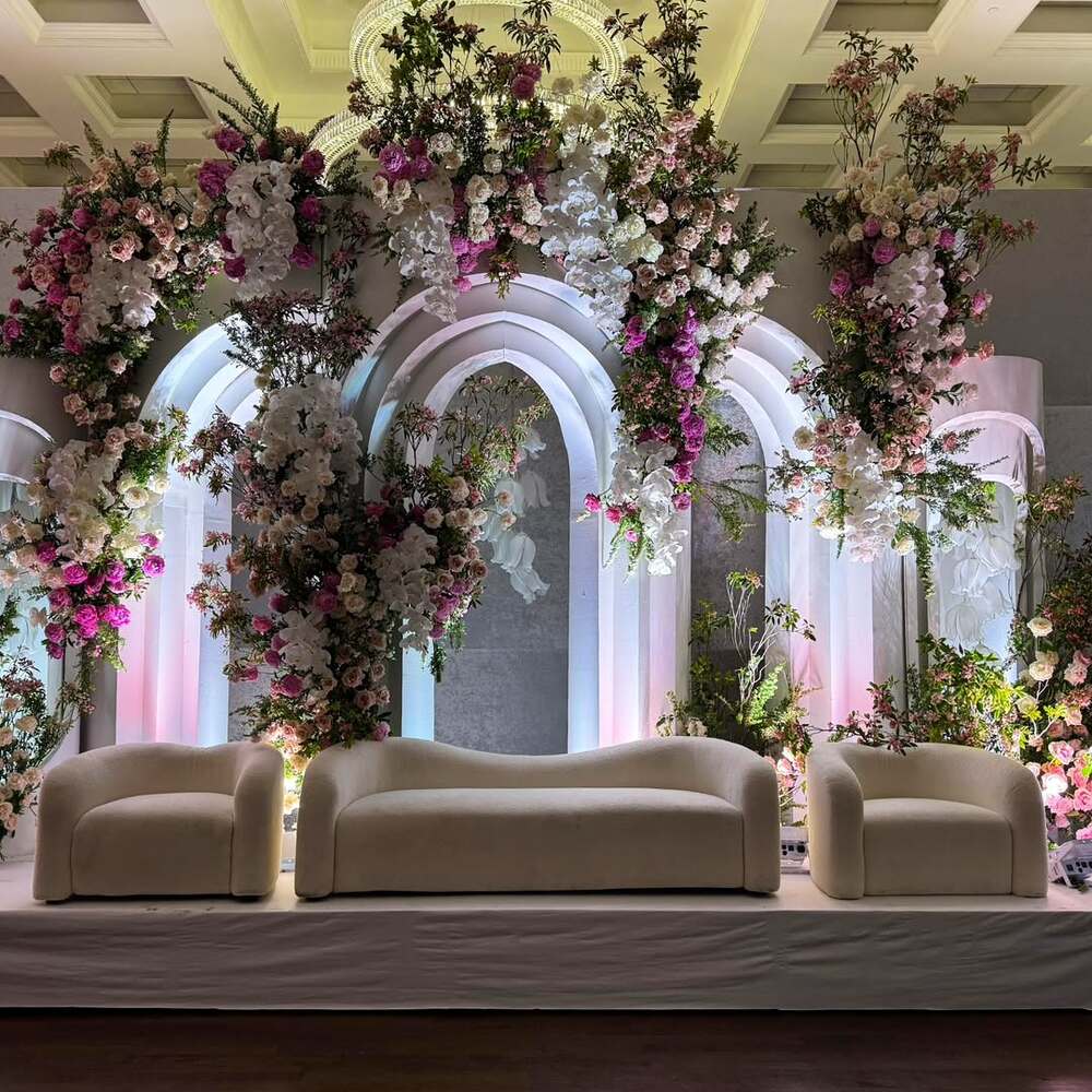 Elegant floral arch with seating
