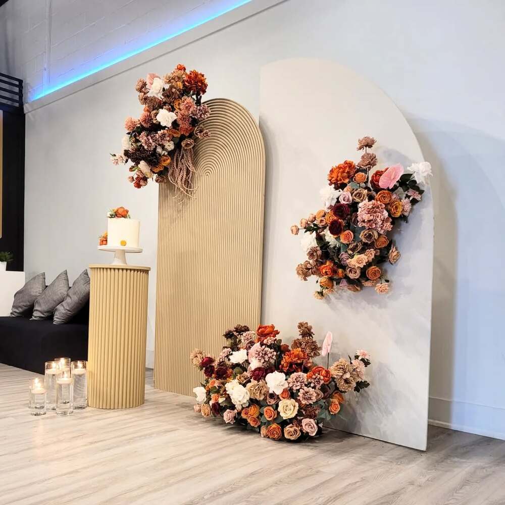 Modern floral arrangement with backdrop