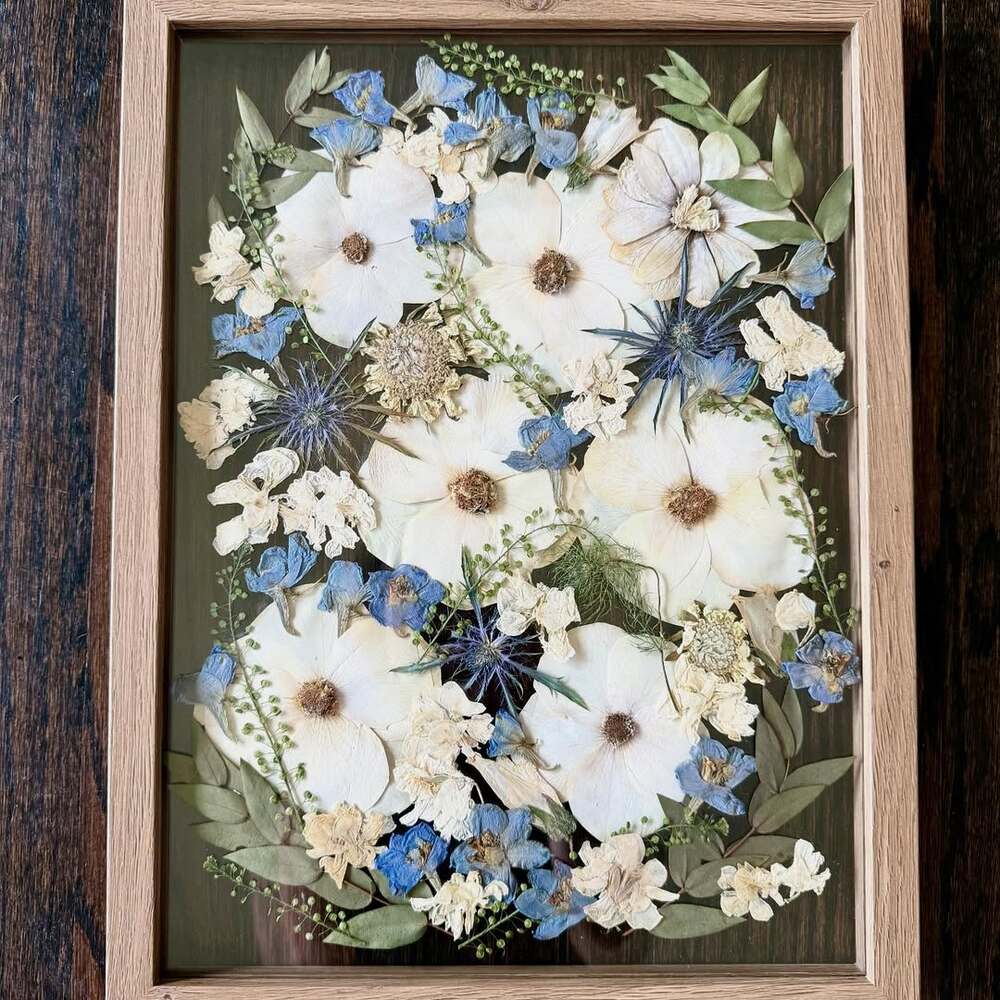 Framed dried flowers in artistic design