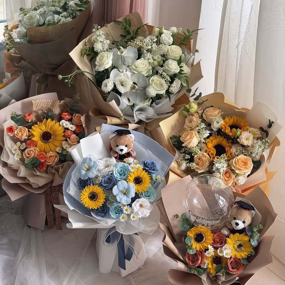 Elegant sunflower and rose bouquets