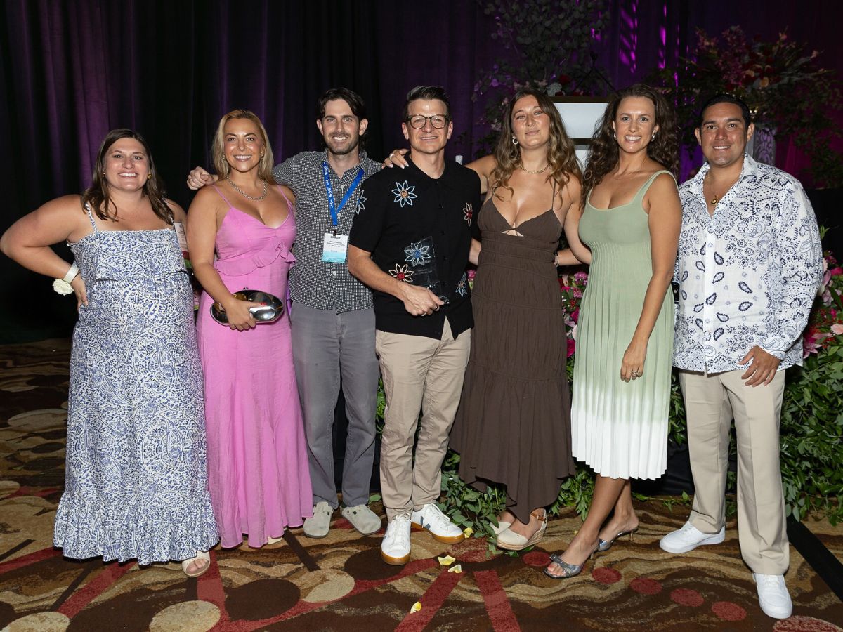 Sam Bowles AAF director of operations at Allens Flowers presented with rising star award SAF Phoenix 2025