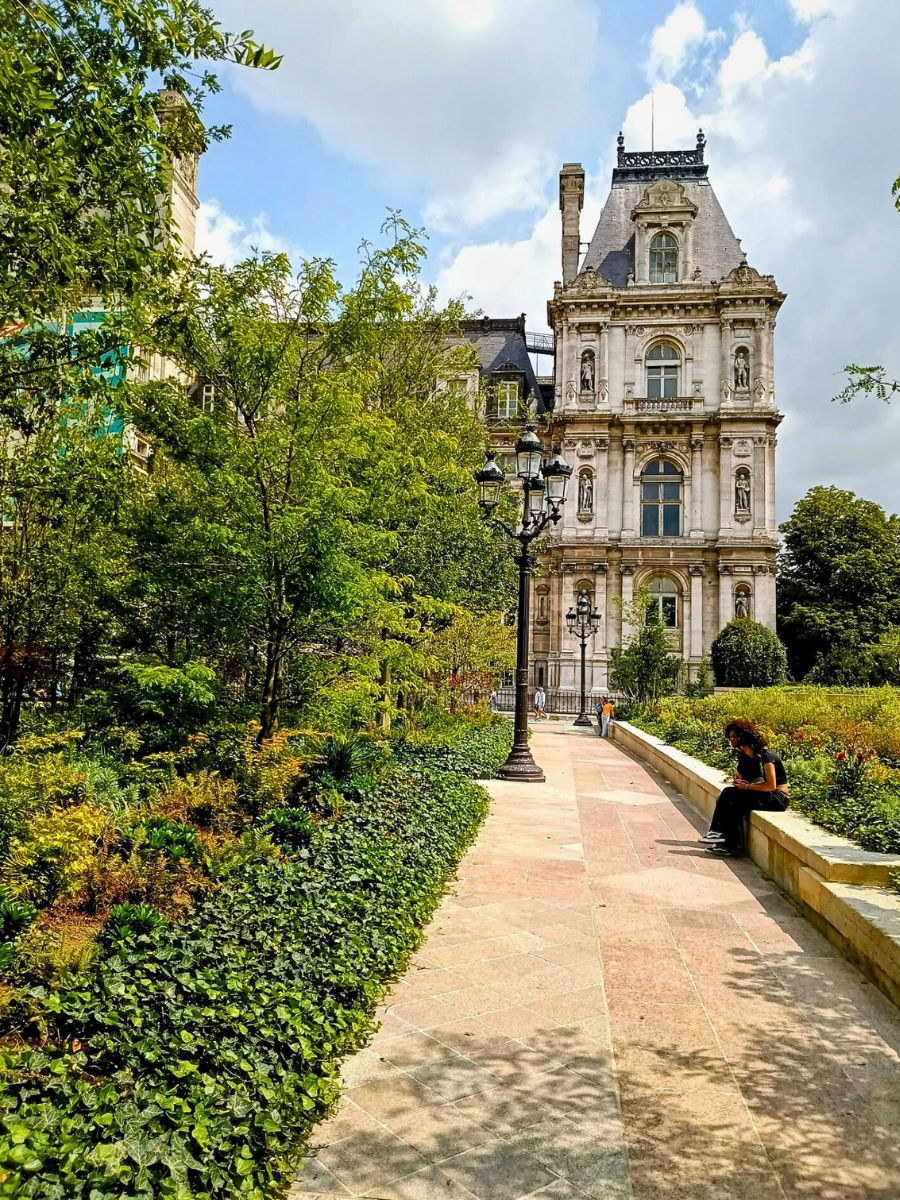 Square of Hôtel de Ville Paris The Square of Hôtel de Ville Paris, Now Pulsates With Greenery and the Shade of Towering Trees, in an Urban Forest.