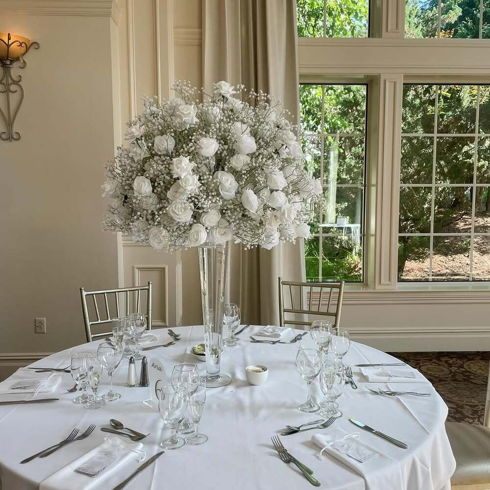 Elegant white wedding flower centerpiece