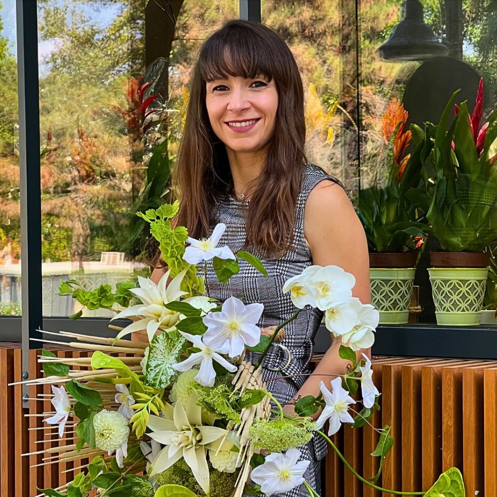 Claudia With a Bouquet of Flowers From Marginpar