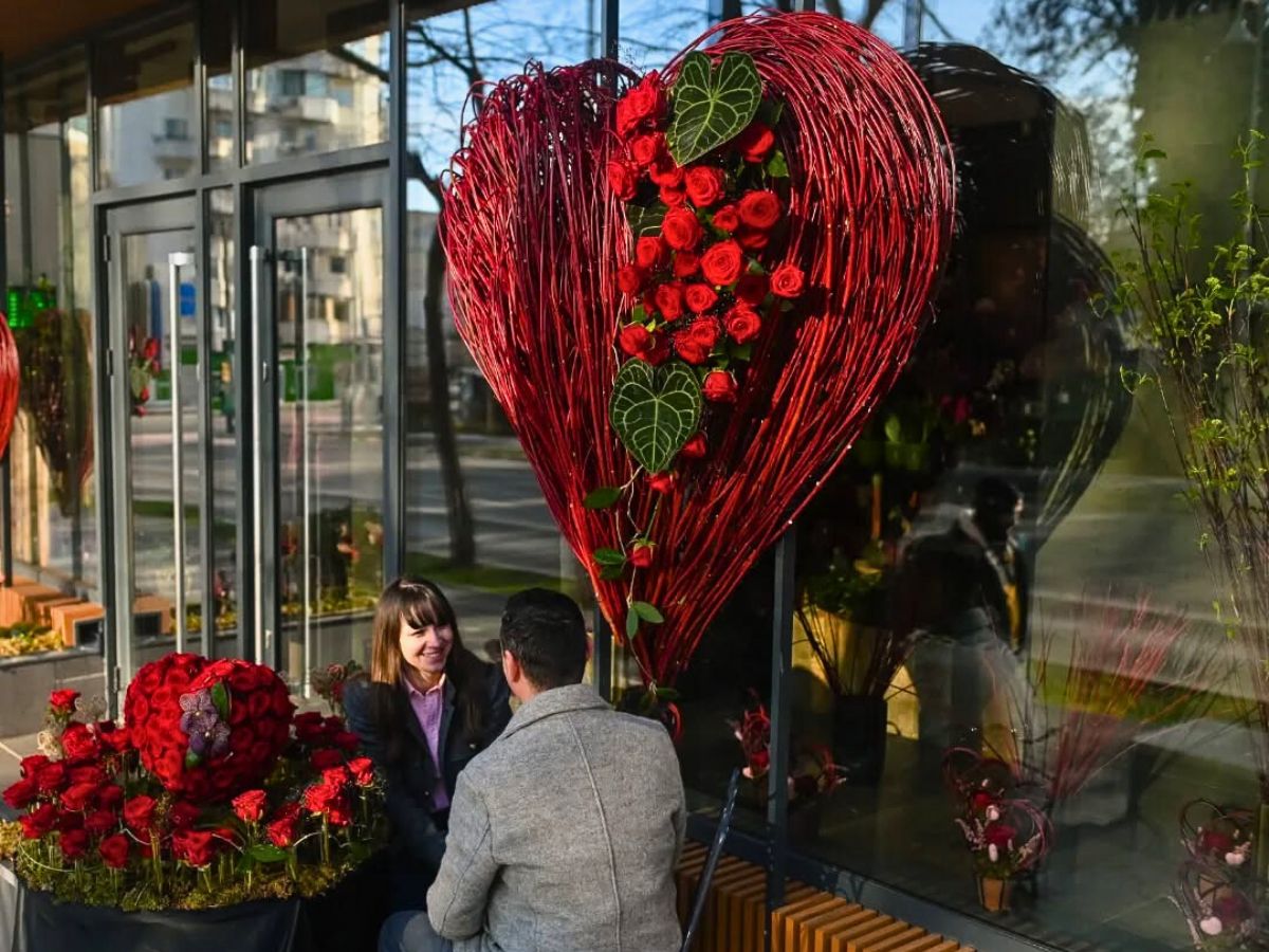 Claudia Tararache and Her Husband Creating Window Design for Valentine for Porta Nova Red Naomi
