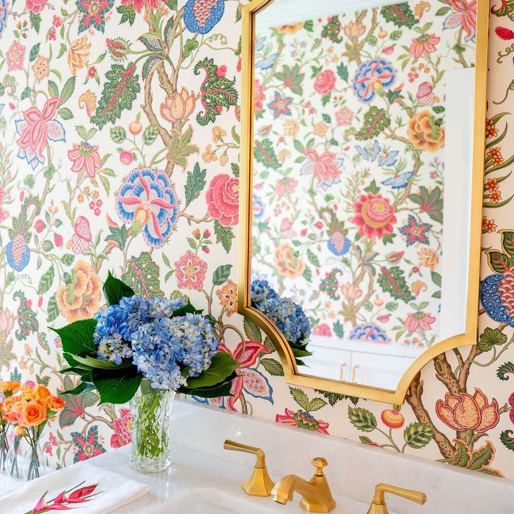 Floral wallpaper brightens elegant bathroom