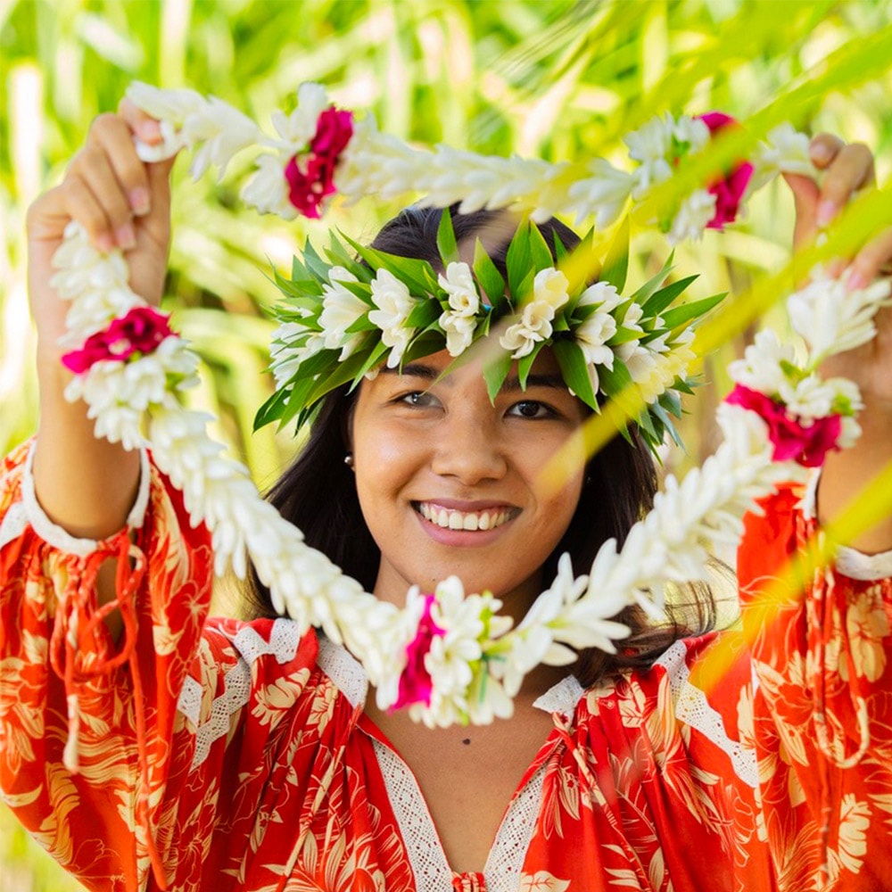 Girl with Gardenia taitensis wreath