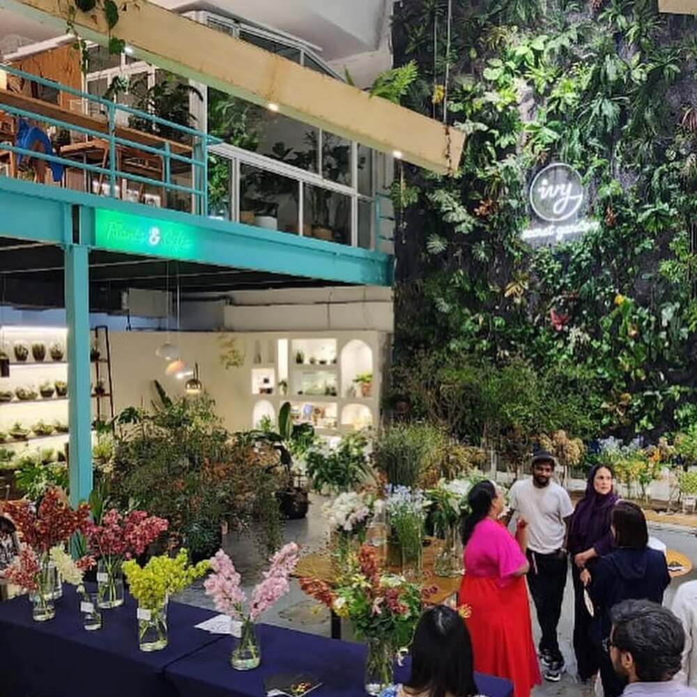 Indoor flower exhibition with vertical garden