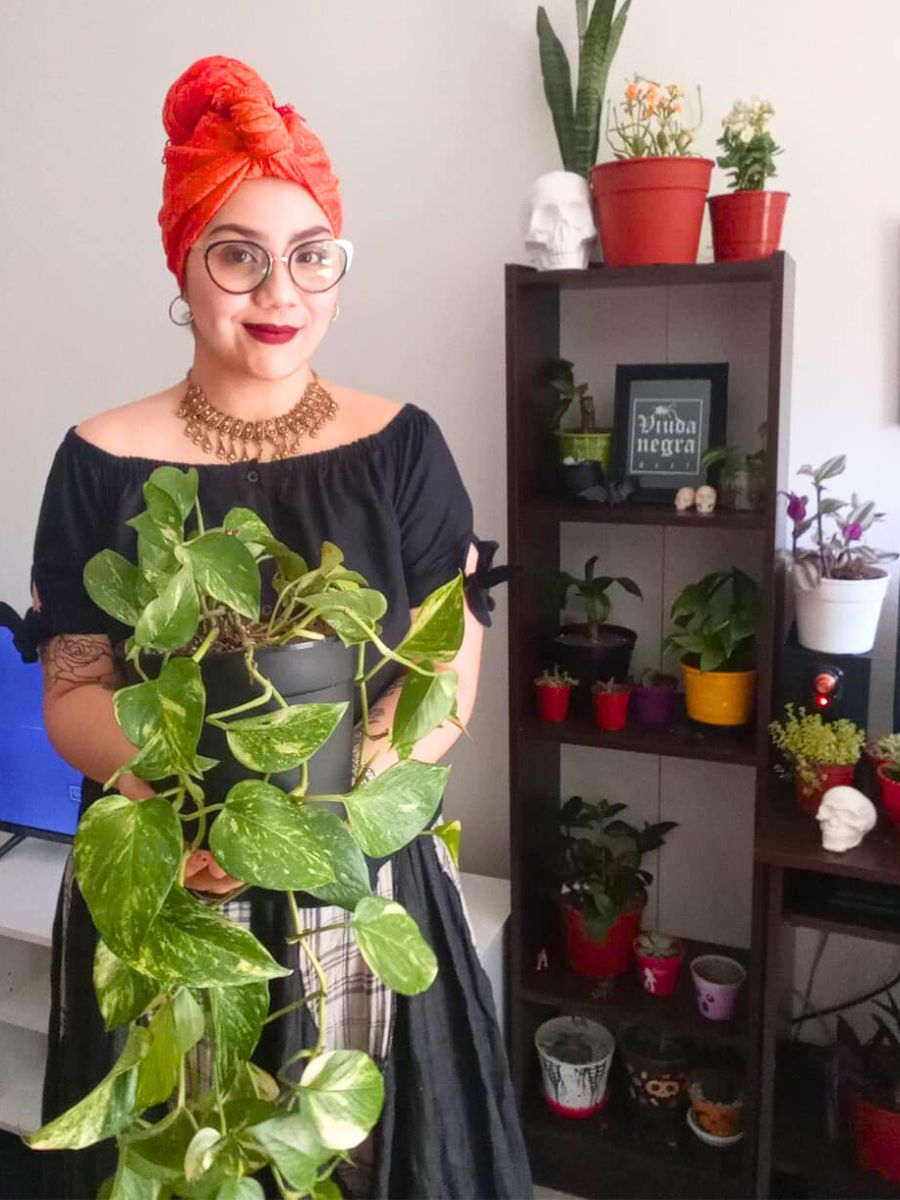Girl with a pothos plant
