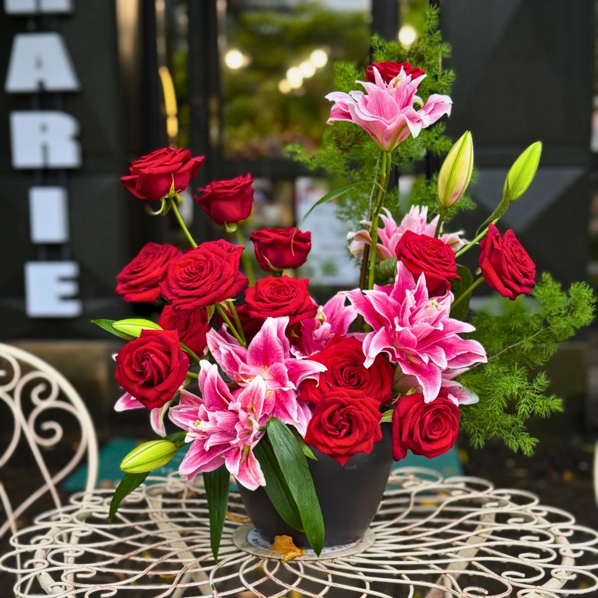 Roses and Lilies for a Romantic Dinner by Andrei Bindea