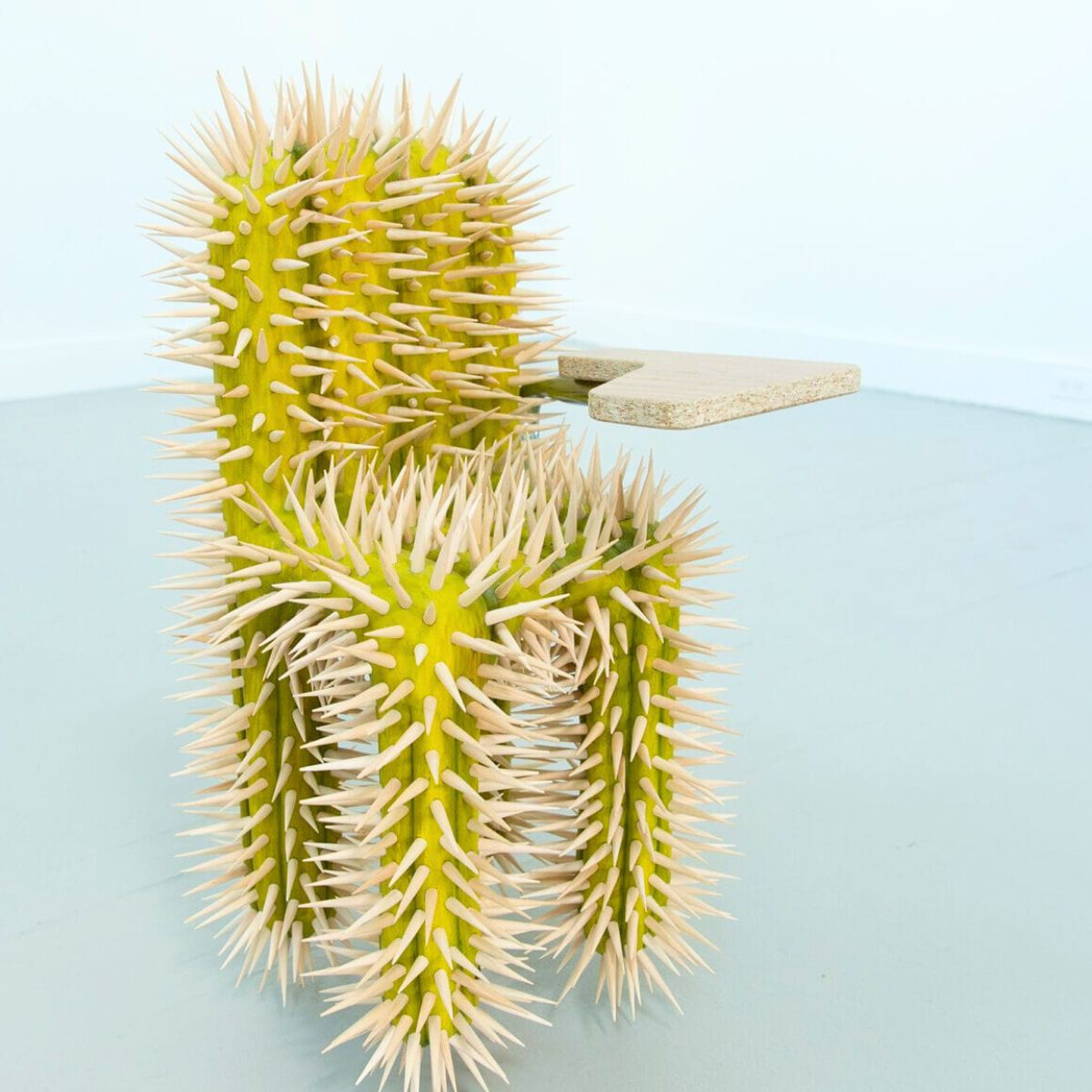 Spiky chair with wooden spikes