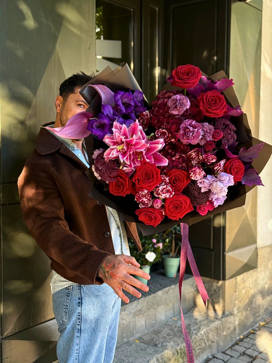 A Bold Bouquet With Red Naomi Roses and a Combination of Lilies and Other Flowers by Andrei Bindea