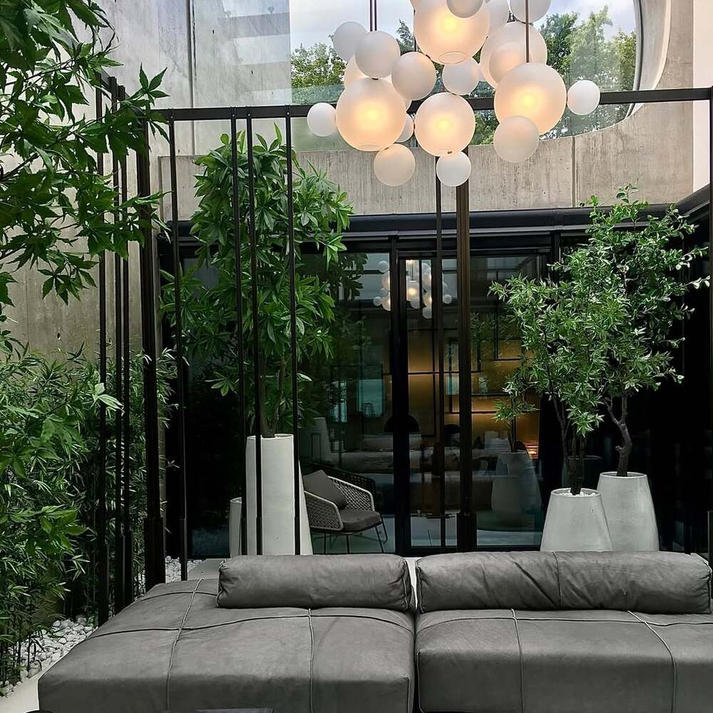 Modern atrium seating with greenery