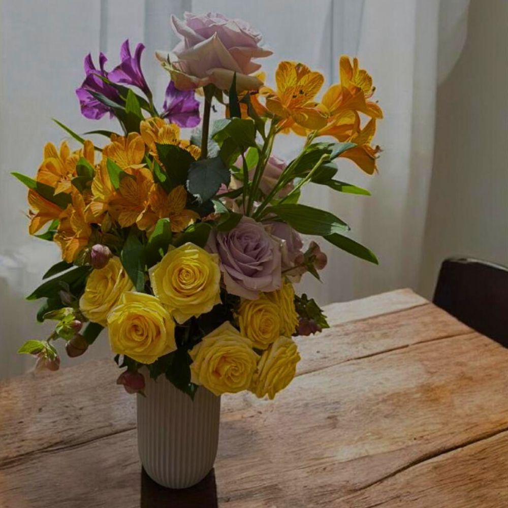 Roses and Alstroemeria in a vase United Selections’ Perfect Roses to Capture the Spirit of the Fall Season in Autumnal Designs - Thursd Article