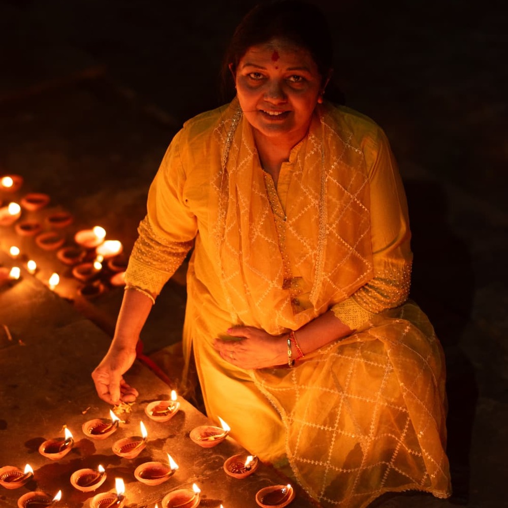 Lady lighting diyas Lady lighting diyas