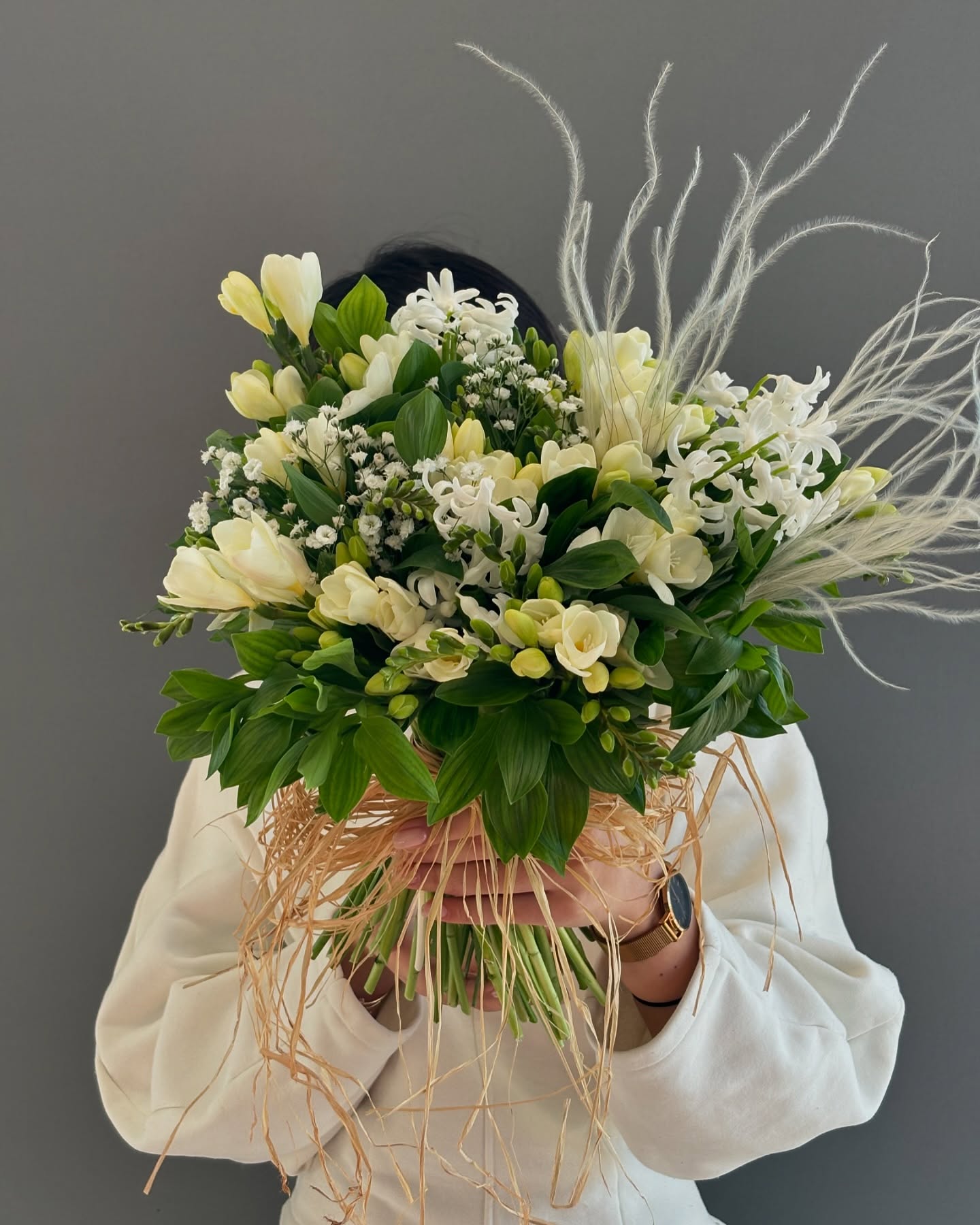floral arrangement featuring white freesias