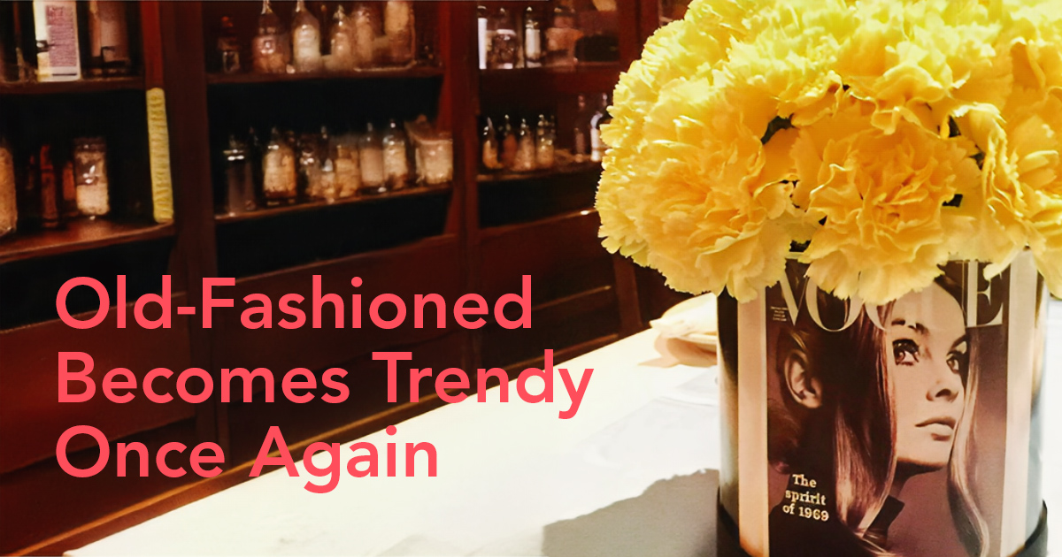 Yellow carnations in Vogue vase