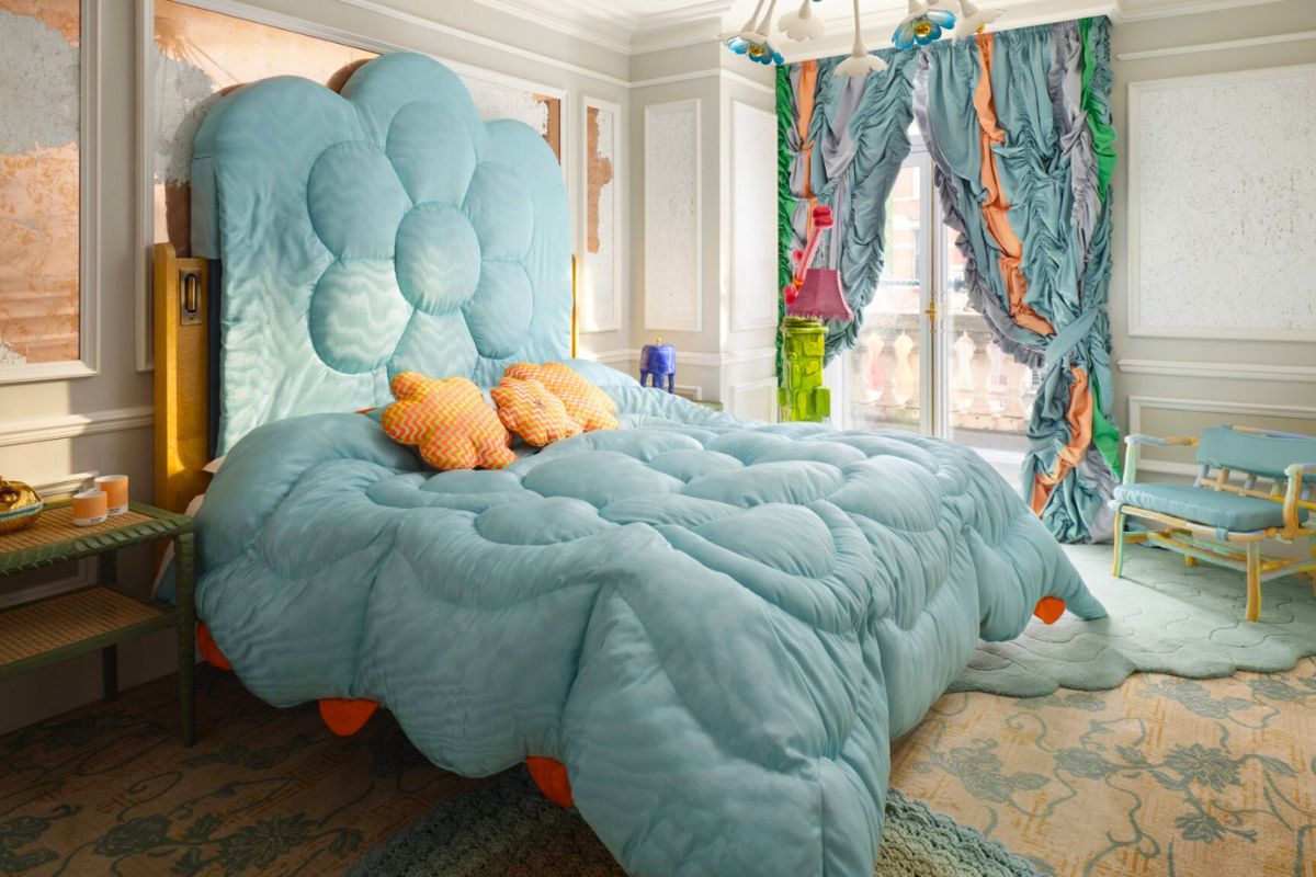 Flower themed bed in turquoise color Flower themed bed in turquoise color