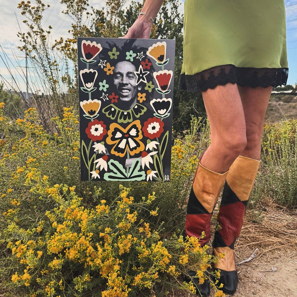 Hilary Heart with her 70s aesthetics-inspired Bob Marley portrait.