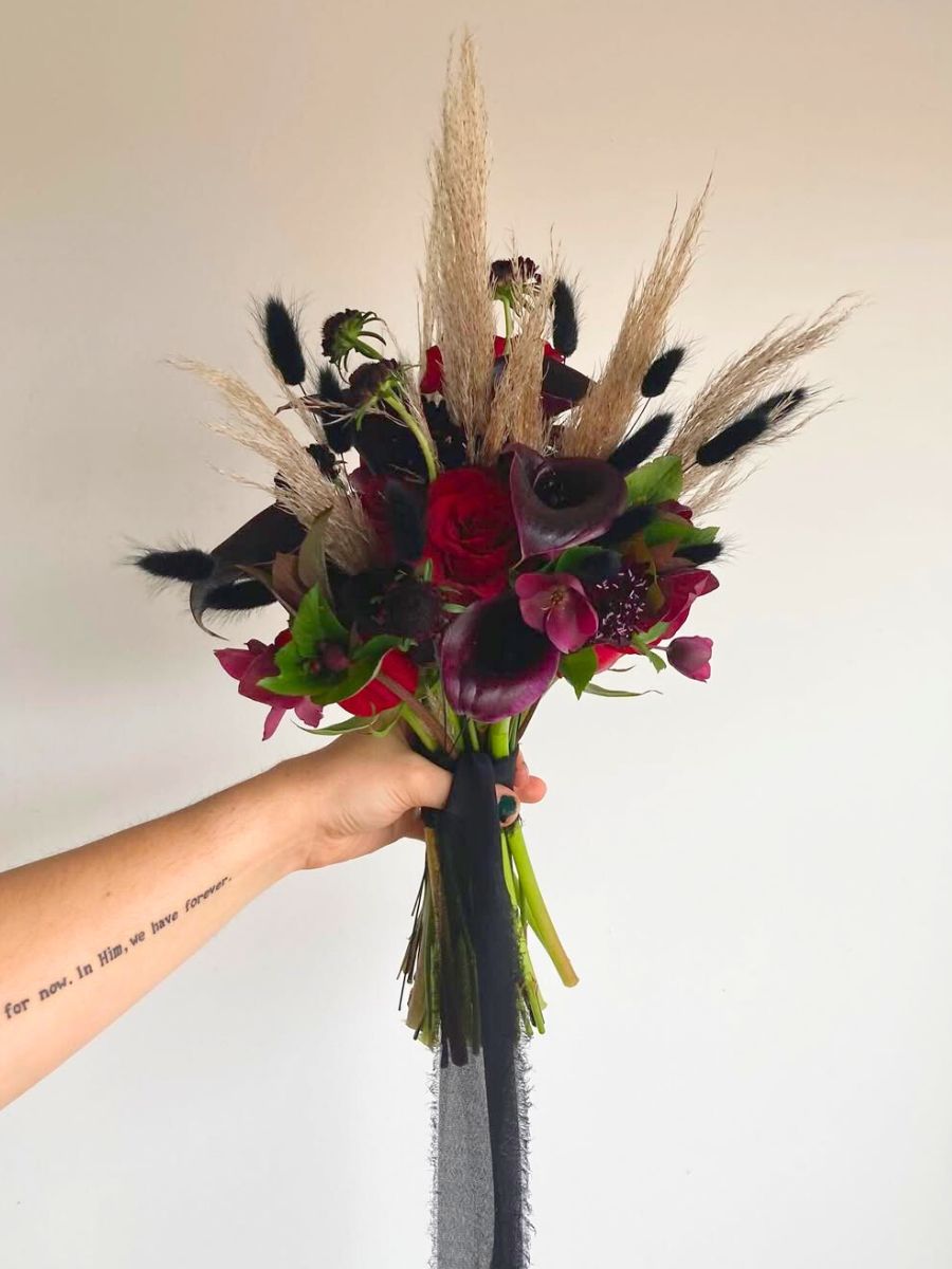 A Halloween inspired bouquet with purple callas A Halloween inspired bouquet with purple callas