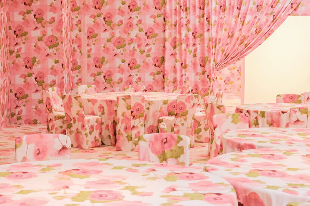Details of table cloths and curtains in rose print Details of table cloths and curtains in rose print