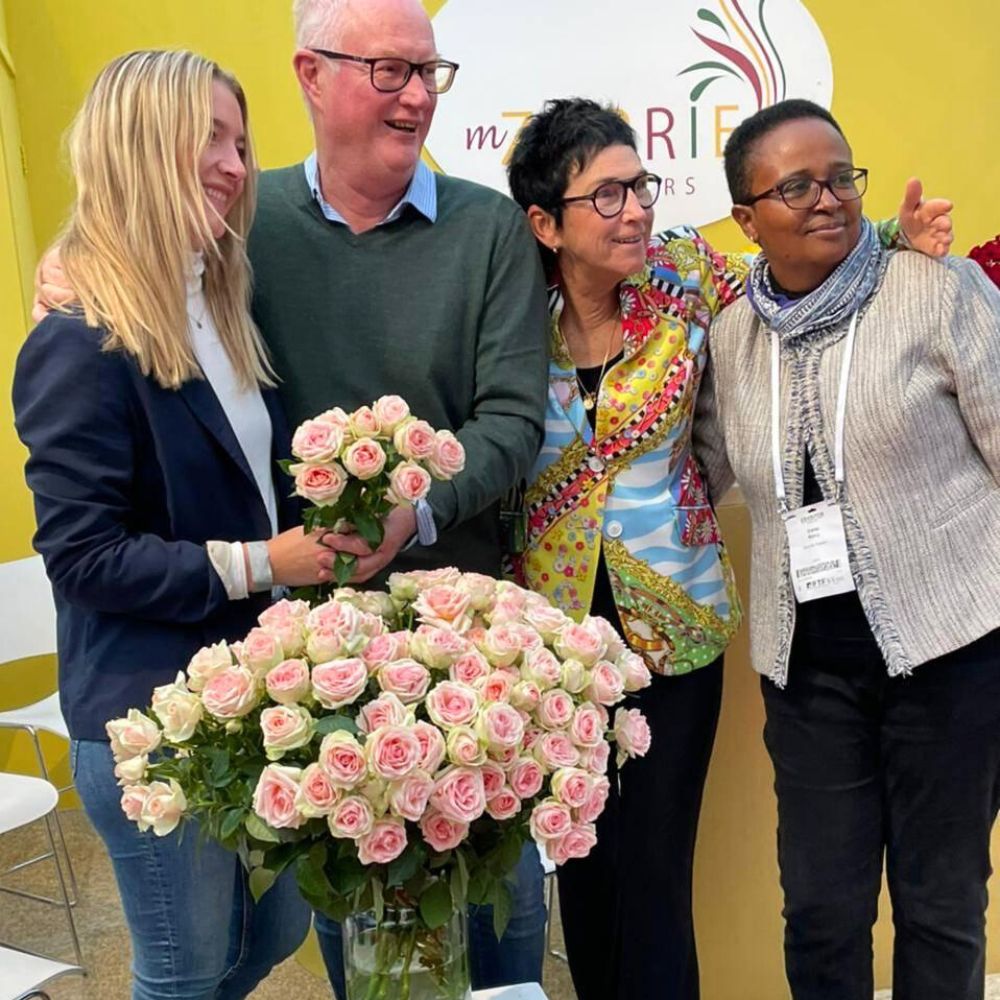 Breeder Viking Roses celebrating Mzurrie Flowers for being the best grower of their spray rose Inger Kristen Mzurrie Flowers