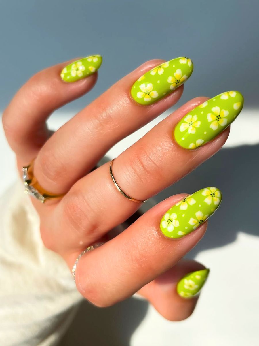 Bright green hibiscus flower nails