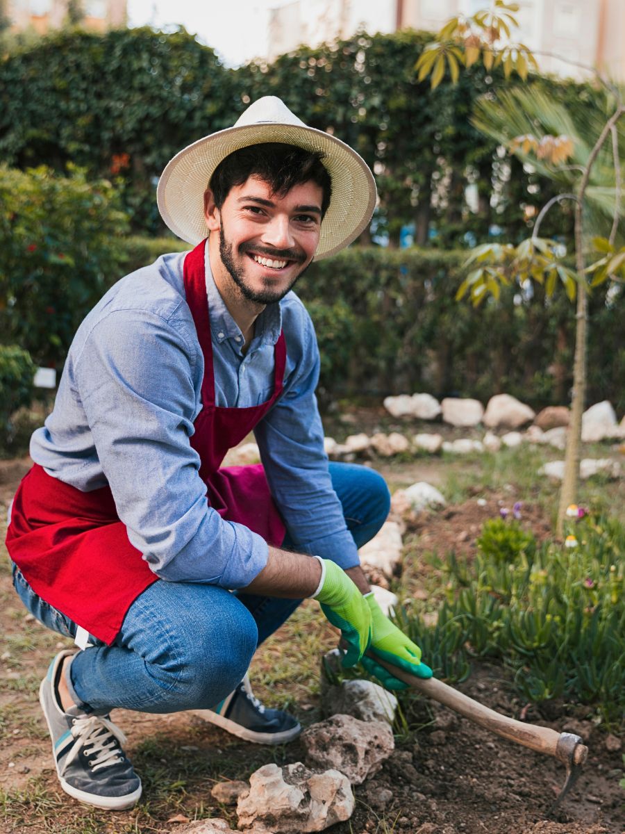 a gardener taking care of the garden soil