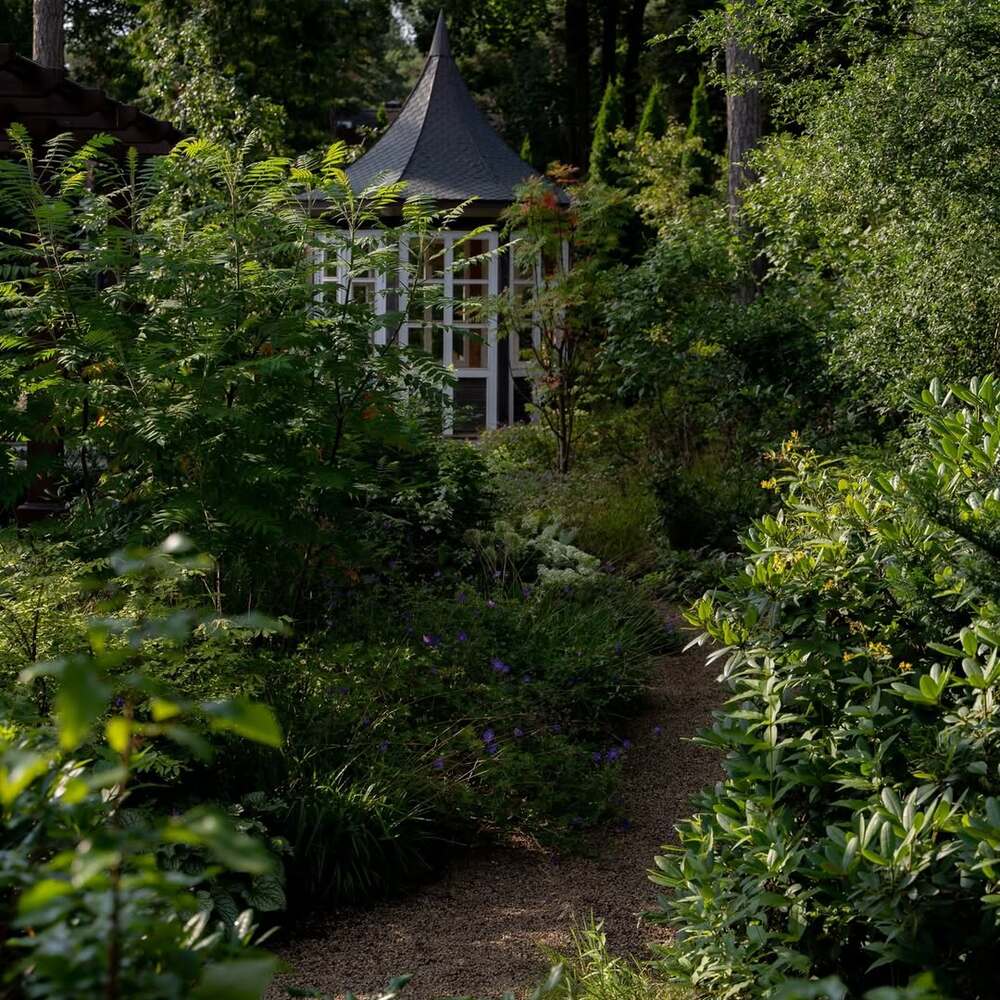  Secluded garden pavilion on winding path
