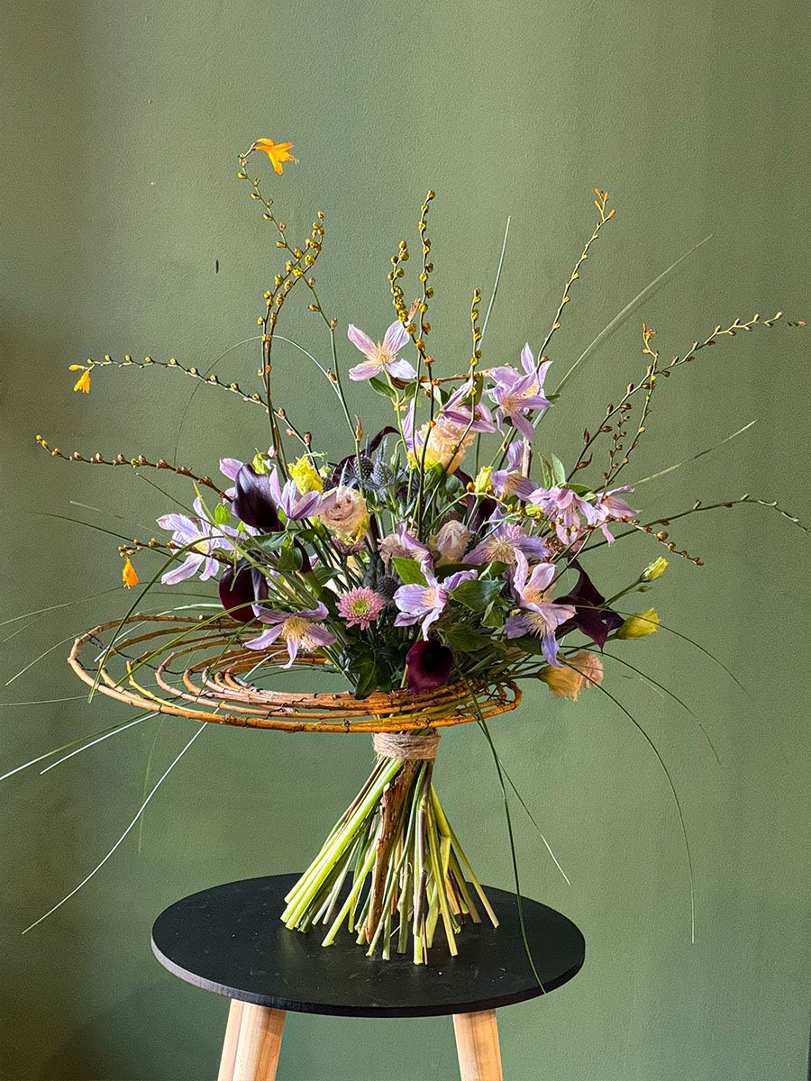 Andrei Bindea purple calla and clematis bouquet