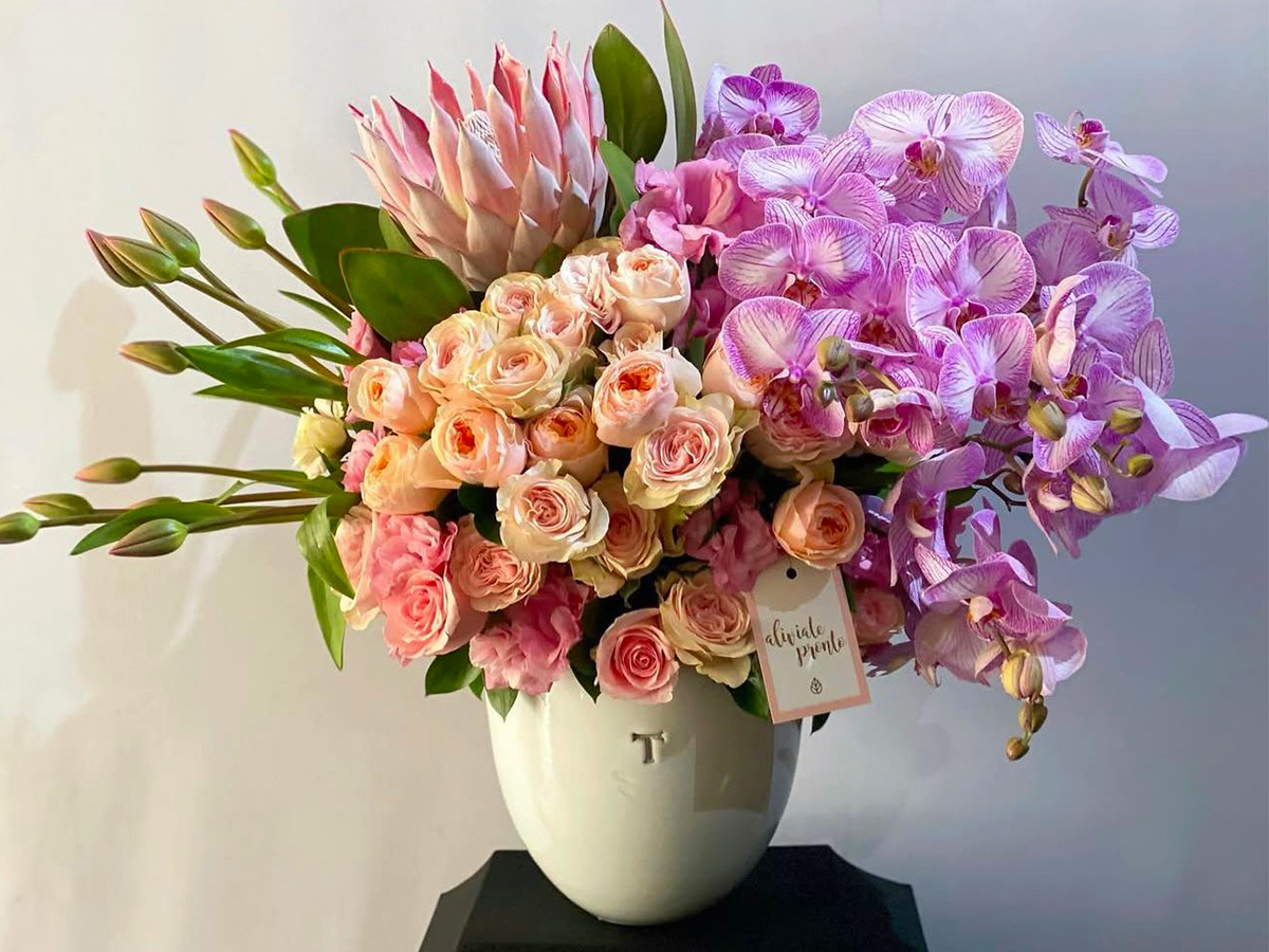 Lu Vargas pink tulips protea orchids bouquet Lu Vargas pink tulips protea orchids bouquet