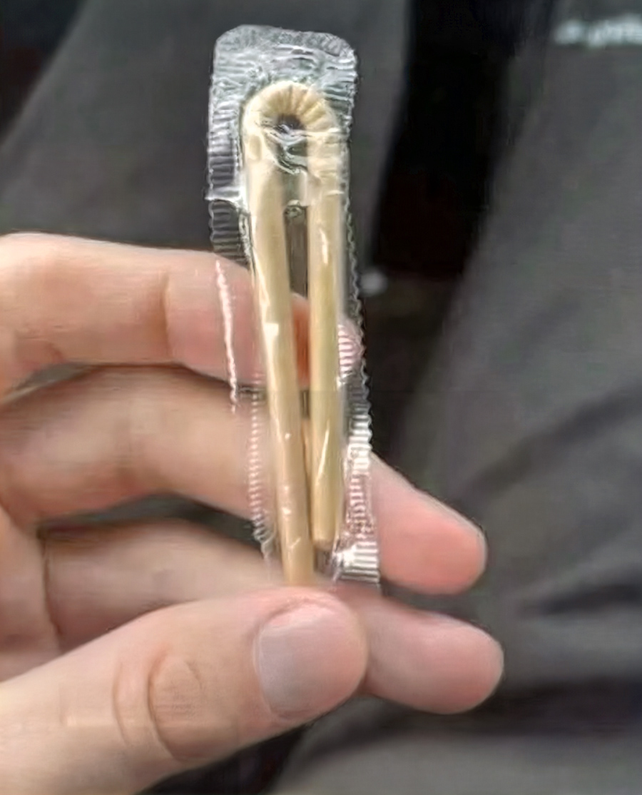 Paper straw in a plastic sleeve