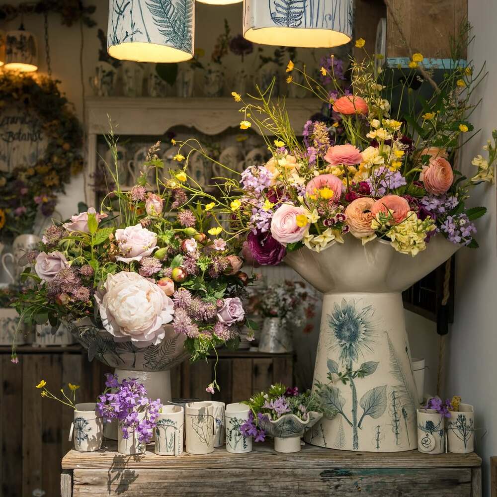 Artisan Vessels Displaying Seasonal Flowers