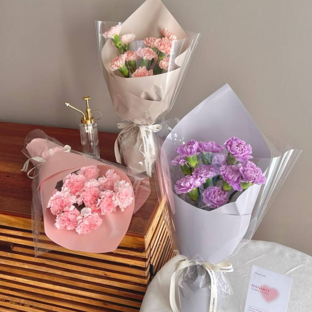  Three carnation bouquets packaged for sale